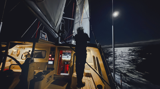 Miquel admires the moon after taking a sight at dusk. 