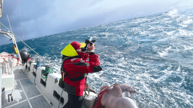 Crew mate Carlos taking sun sights in the South Atlantic.