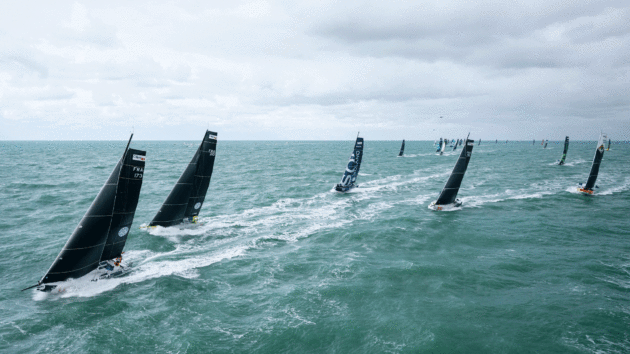 Class 40s stream out from the Le Havre start.