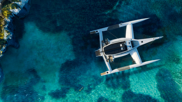 Anahita 100 birds-eye view over clear water