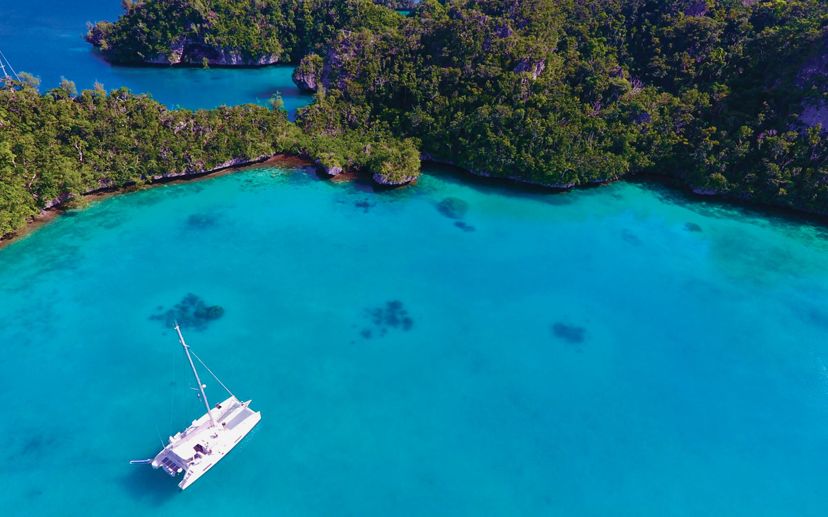sailing-around-the-world-couples-guide-bay-of-islands-fiji-credit-haley-haltom